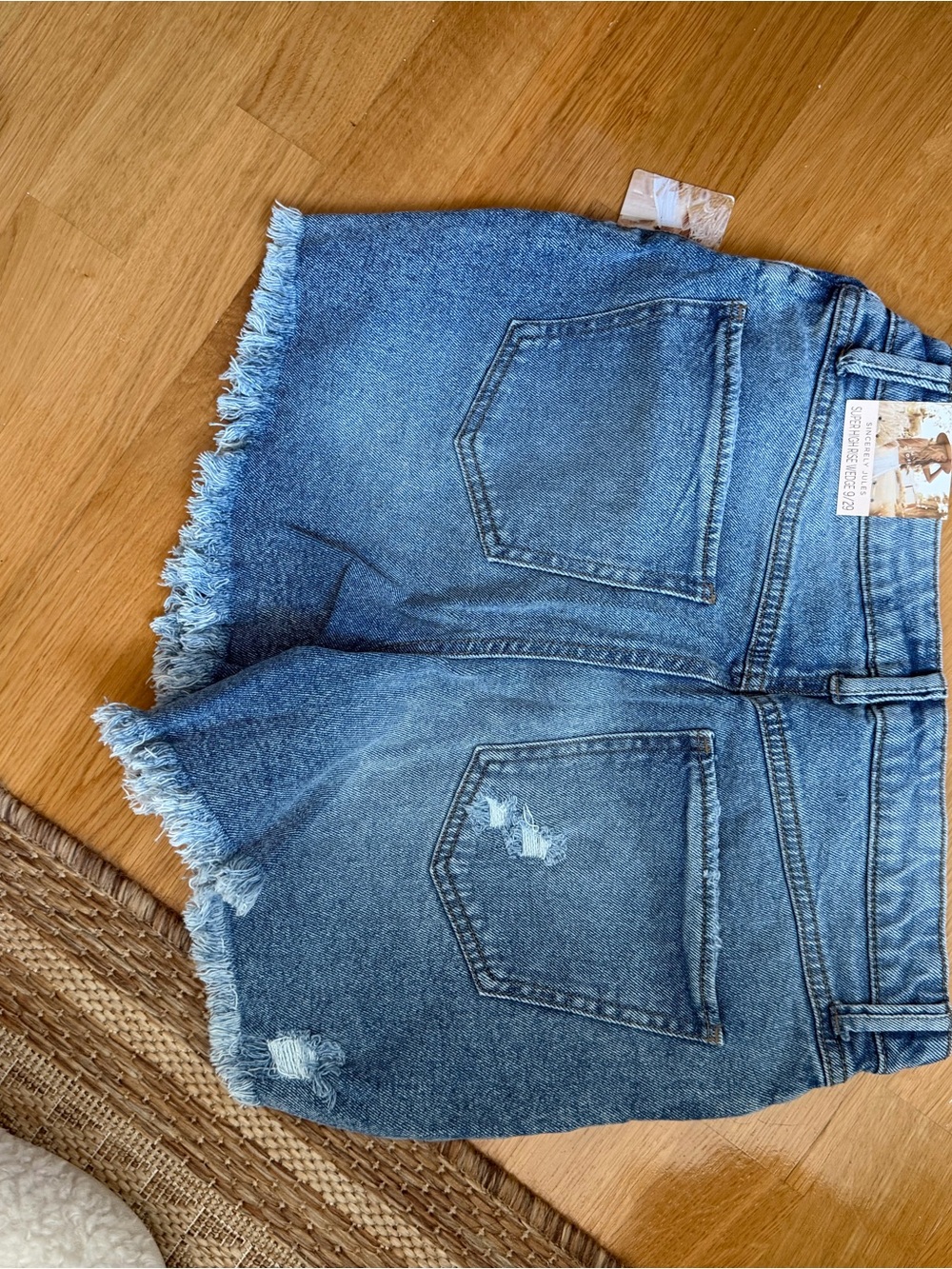 Sincerely Jules Distressed High-Rise Denim Shorts in Medium Blue